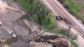 An aerial look at the track erosion that has the CTA Yellow Line suspended and portions of McCormick Drive closed to traffic. | Courtesy ABC-7 Chicago