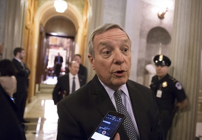 Senate Minority Whip Richard Durbin of Ill., leaves the Senate chamber on Capitol Hill in Washington, Thursday, May 19, 2016, as the Senate worked on its $1.1 billion plan to combat the Zika virus, setting the stage for difficult negotiations with House Republicans over how much money to devote to fighting the virus and whether to cut Ebola funding to help pay for it. (AP Photo/J. Scott Applewhite)