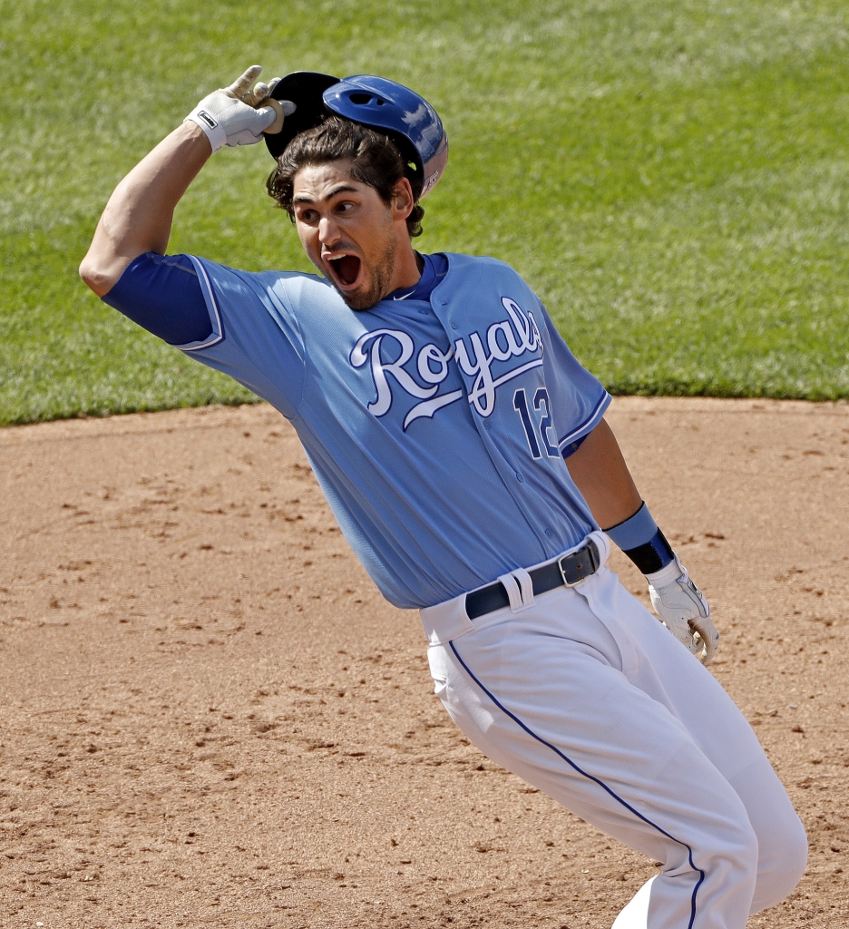 Kansas City Royals' Brett Eibner celebrates after hitting the game-winning single during the ninth inning of a baseball game against the Chicago White Sox on Saturday, May 28, 2016, in Kansas City, Mo. The Royals won 8-7. (AP Photo/Charlie Riedel)