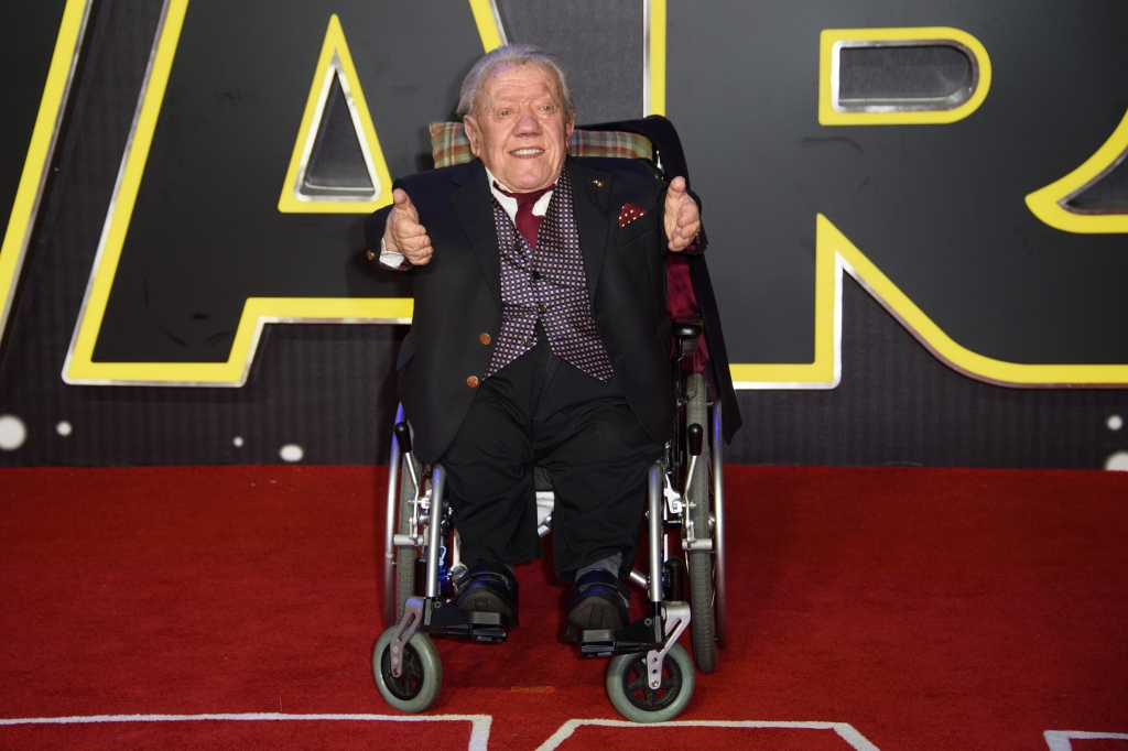 Kenny Baker poses for photographers upon arrival at the European premiere of the film 'Star Wars: The Force Awakens ' in London, Wednesday, Dec. 16, 2015. (Photo by Jonathan Short/Invision/AP)